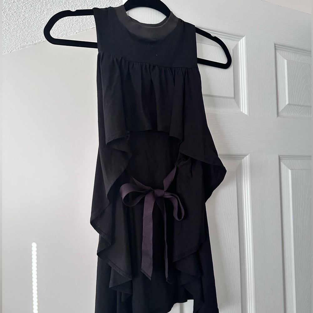 Very unique tie back ruffle top